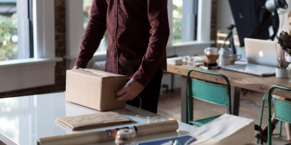 A customer handling a Last Mile Delivery carton box